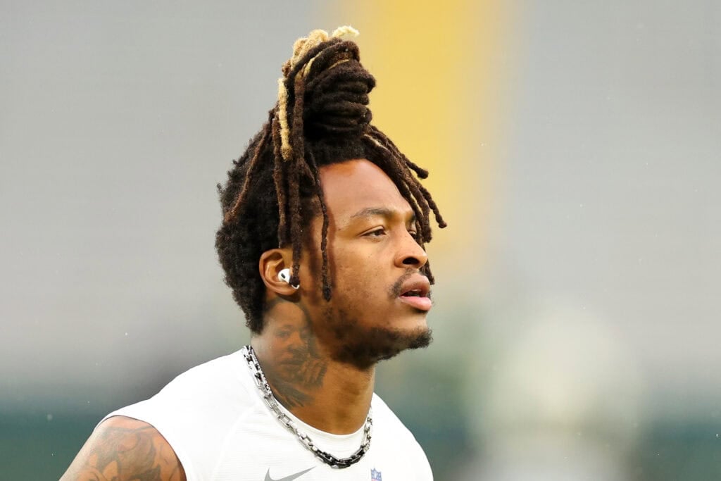 GREEN BAY, WISCONSIN - OCTOBER 13: Xavier McKinney #29 of the Green Bay Packers participates in warmups prior to a game against the Arizona Cardinals at Lambeau Field on October 13, 2024 in Green Bay, Wisconsin. The Packers defeated the Cardinals 34-13.