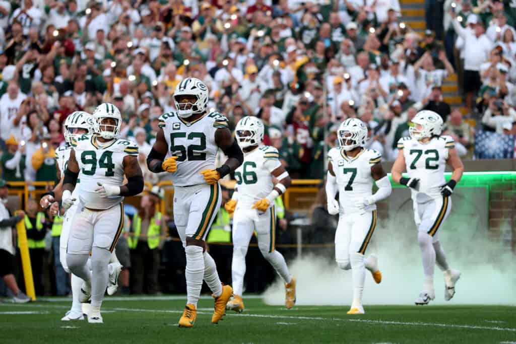 GREEN BAY, WISCONSIN - SEPTEMBER 11: The Green Bay Packers take the field prior to the game against the Washington Commanders at Lambeau Field on September 11, 2025 in Green Bay, Wisconsin.