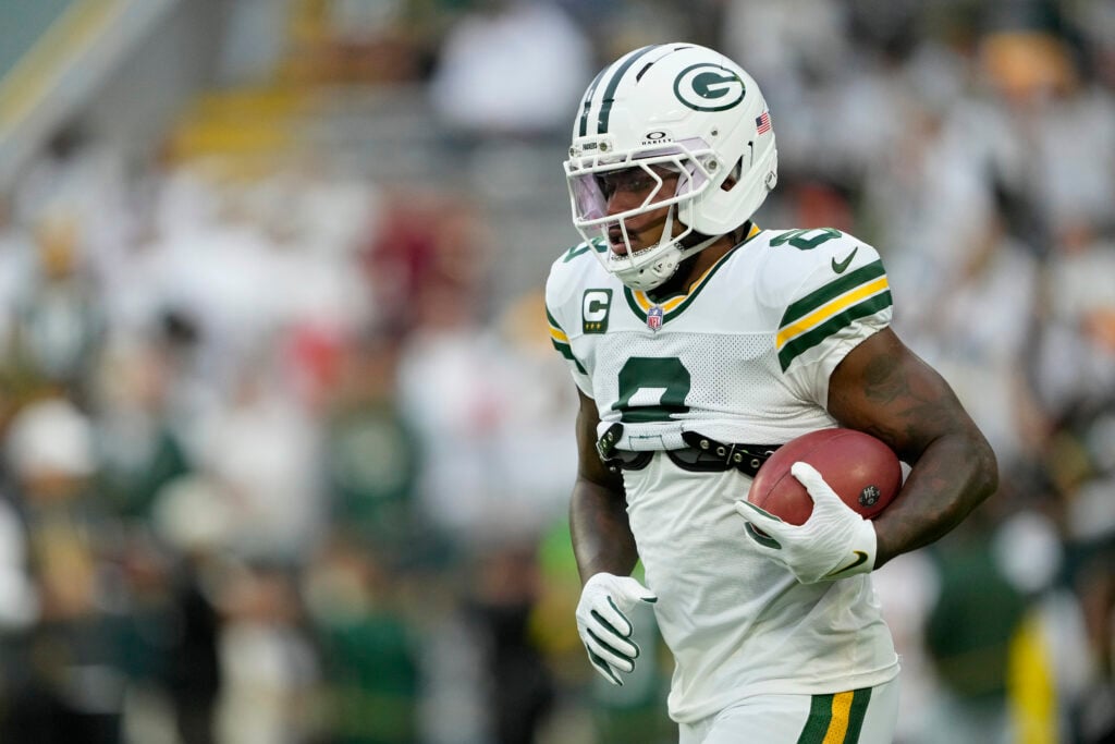 GREEN BAY, WISCONSIN - SEPTEMBER 11: Josh Jacobs #8 of the Green Bay Packers warms up prior to the game against the Washington Commanders at Lambeau Field on September 11, 2025 in Green Bay, Wisconsin.