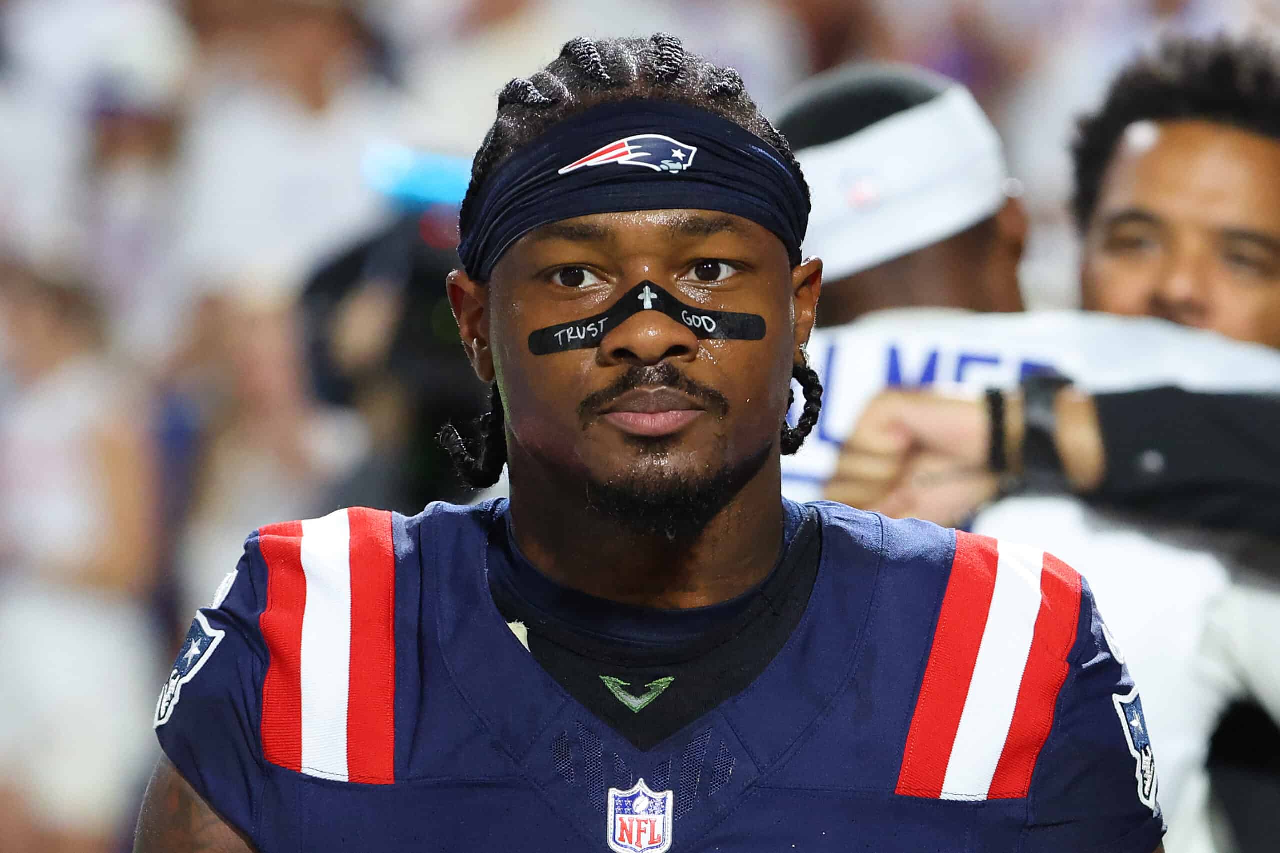 ORCHARD PARK, NEW YORK - OCTOBER 05: Stefon Diggs #8 of the New England Patriots looks on during pregame prior to the game against the Buffalo Bills at Highmark Stadium on October 05, 2025 in Orchard Park, New York.